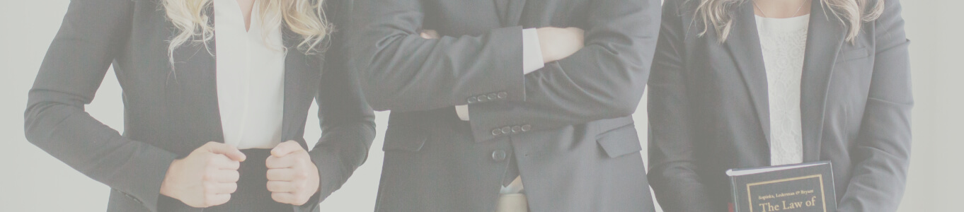 Three lawyers standing side by side